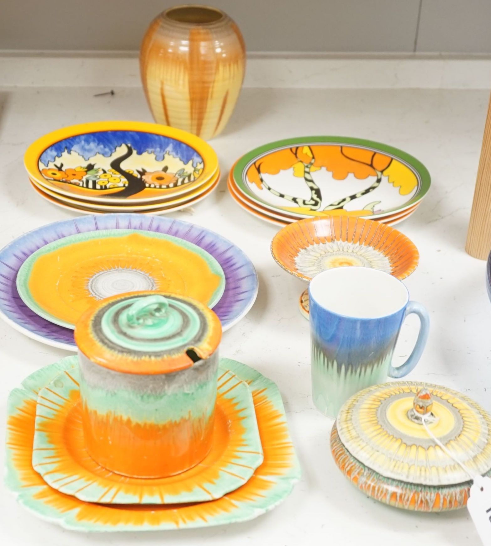 A quantity of Shelley dripware and six Wedgwood reproduction Clarice Cliff plates, largest plate diameter 24cm